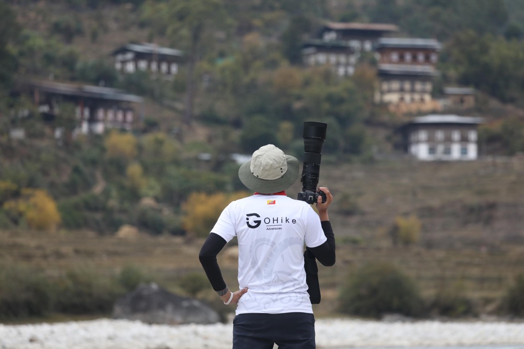 Monk turning prayer wheels